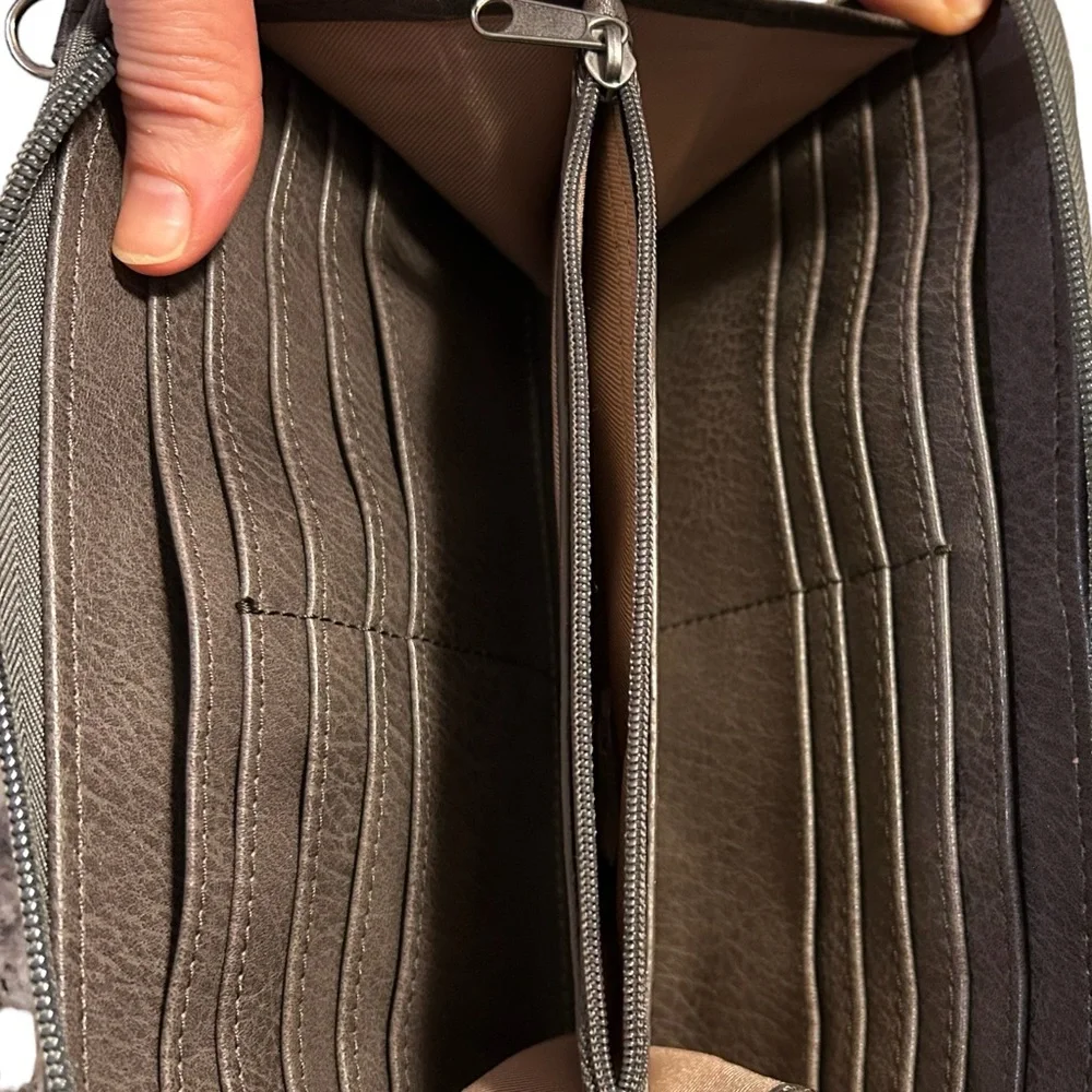 The Sak Iris grey leather wristlet